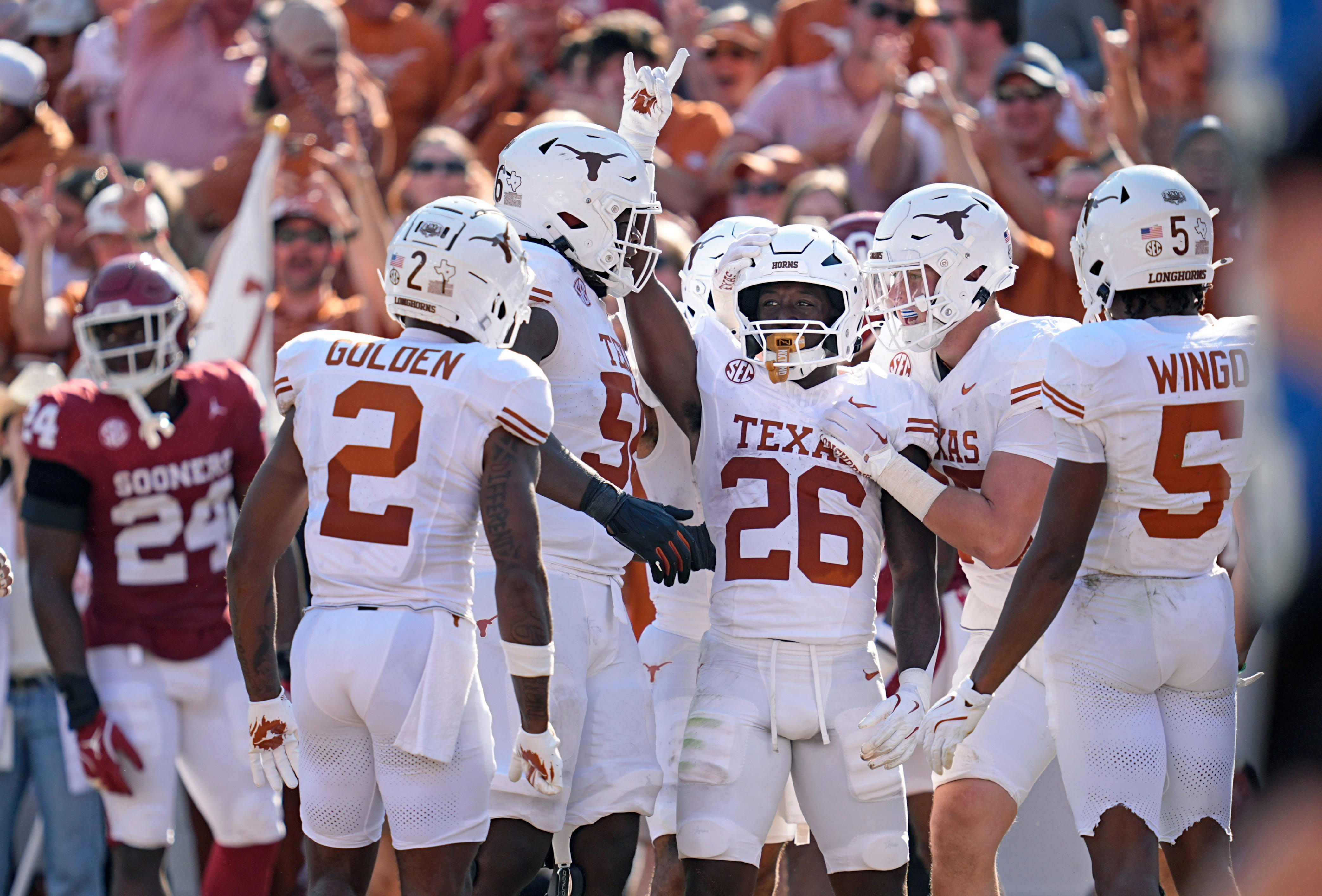 Texas running back Quintrevion Wisner (26) celebrates a touchdown in the first half against Oklahoma at the Cotton Bowl Stadium in Dallas, Texas, Saturday, Oct., 12, 2024.