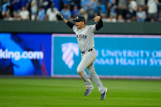 Oct 10, 2024; Kansas City, Missouri, USA; New York Yankees outfielder Juan Soto (22) celebrates a win over the Kansas City Royals during game four of the ALDS for the 2024 MLB Playoffs at Kauffman Stadium. Mandatory Credit: Jay Biggerstaff-Imagn Images