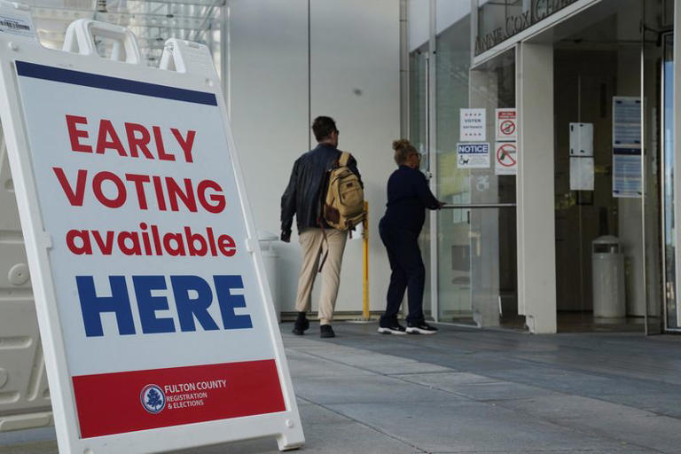 reports record turnout as early voting begins in US