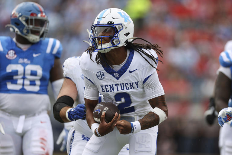 Kentucky quarterback Gavin Wimsatt (2) reacts after running the ball during the first half of an NCAA college football game against Mississippi Saturday, Sept. 28, 2024, in Oxford, Miss. (AP Photo/Randy J. Williams)