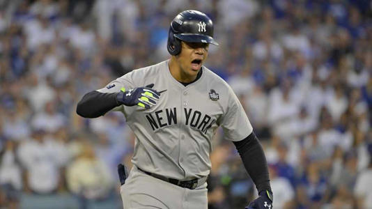 Oct 26, 2024; Los Angeles, California, USA; New York Yankees outfielder Juan Soto (22) celebrates after hitting a solo home run in the third inning against the Los Angeles Dodgers during game two of the 2024 MLB World Series at Dodger Stadium. | Jayne Kamin-Oncea-Imagn Images