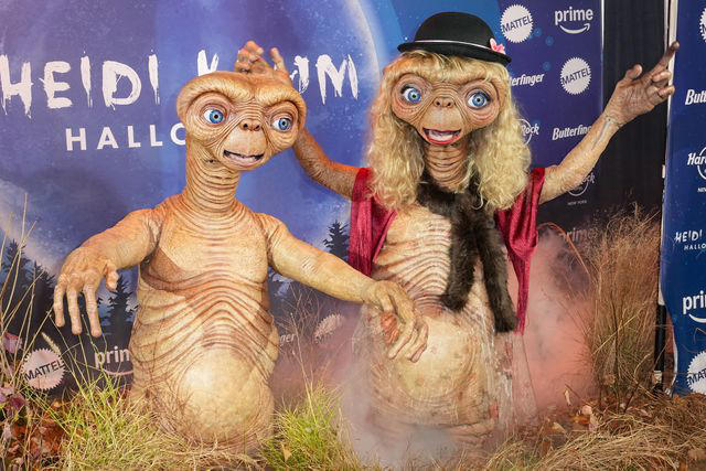 John Nacion/WWD via Getty Tom Kaulitz (left) and Heidi Klum as E.T. on Halloween 2024