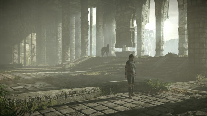 The hero of Shadow of the Colossus stands in a temple.