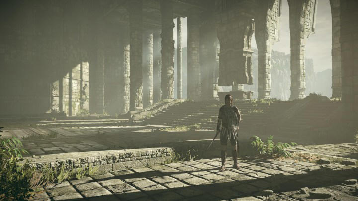 The hero of Shadow of the Colossus stands in a temple.