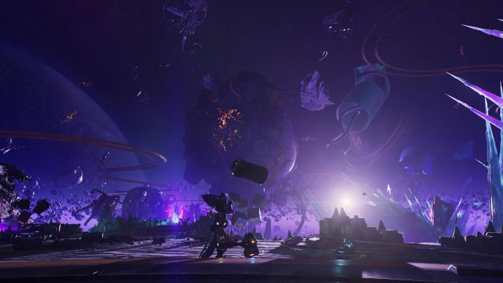 Ratchet stands in front of a planet in Ratchet and Clank: Rift Apart.