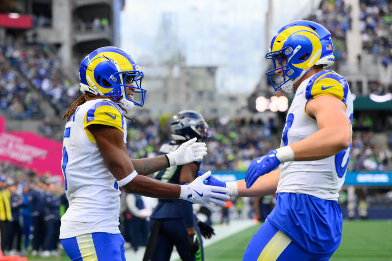 Nov 3, 2024; Seattle, Washington, USA; Los Angeles Rams wide receiver Demarcus Robinson (15) and tight end Davis Allen (87) celebrate after Demarcus Robinson (15) scored a touchdown against the Seattle Seahawks during the second half at Lumen Field. Mandatory Credit: Steven Bisig-Imagn Images