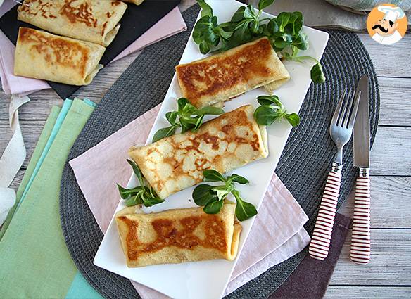 Crêpes gefüllt mit béchamel, käse und schinken
