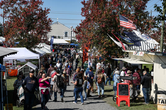 Booths at the homesteading conference sold chicken coops, wool products made with a spinning wheel and the occasional provocative T-shirt.