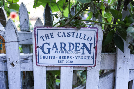 A sign in Castillo’s suburban garden.