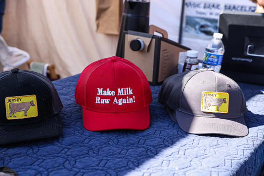 A vendor's hats at the conference.