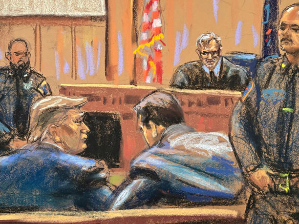 Donald Trump confers with his defense lawyer Todd Blanche in his hush-money trial before New York Supreme Court Justice Juan Merchan. Jane Rosenberg/AP