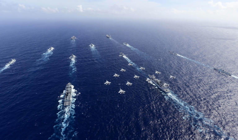 Chinese aircraft carriers Liaoning and Shandong in formation exercise in the South China Sea Sun Xiang/Xinhua via Getty Images