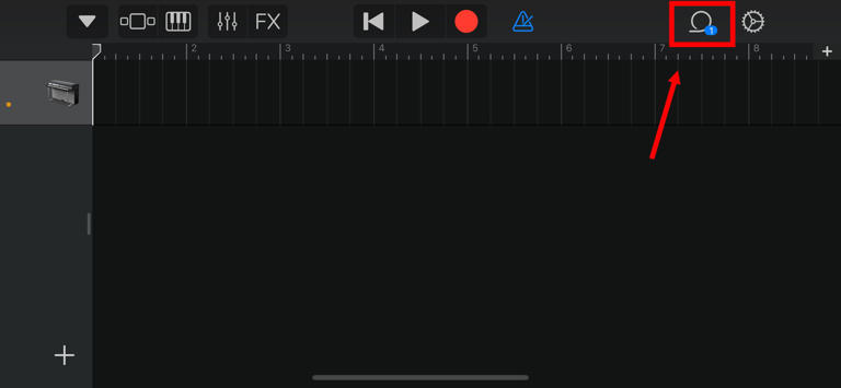 Navigating to the Live Loops tab in a Garageband project.