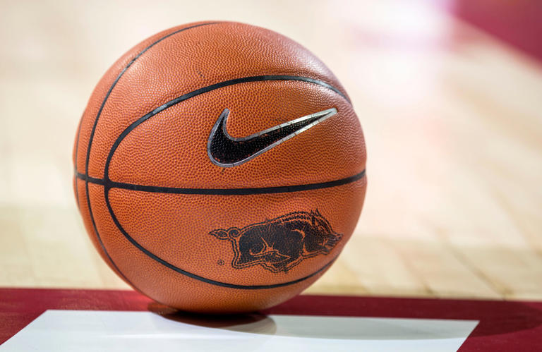 Nov 16, 2014; Fayetteville, AR, USA; A basketball with a Nike logo and Arkansas Razorback logo sits on the floor during a timeout in a game between the Arkansas Razorbacks and Alabama State Hornets at Bud Walton Arena. Arkansas defeated Alabama State 97-79. Mandatory Credit: Beth Hall-USA TODAY Sports