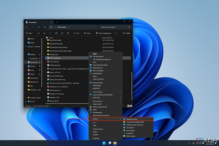 Screenshot of Windows 11 File Explorer showing the context menu option to send a file over Bluetooth