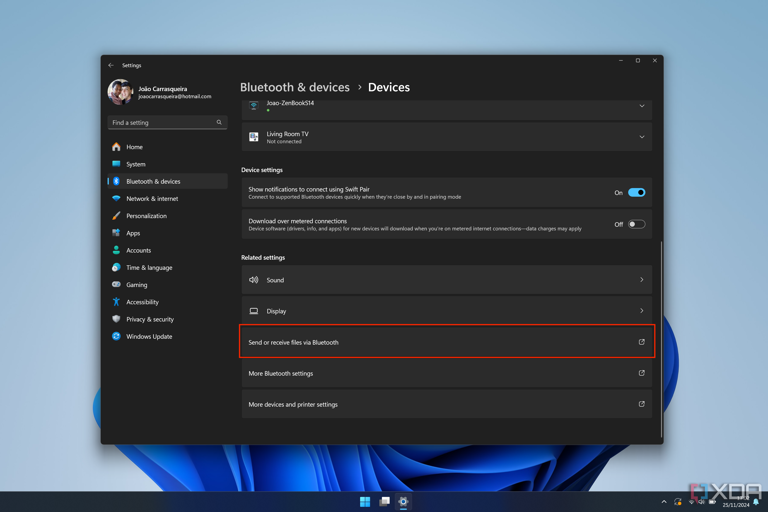 Screenshot of Windows 11 Settings showing the option to send or receive files via Bluetooth