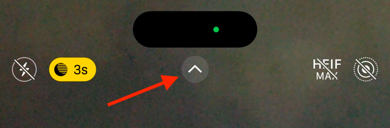 Arrow icon in Camera app on iPhone.