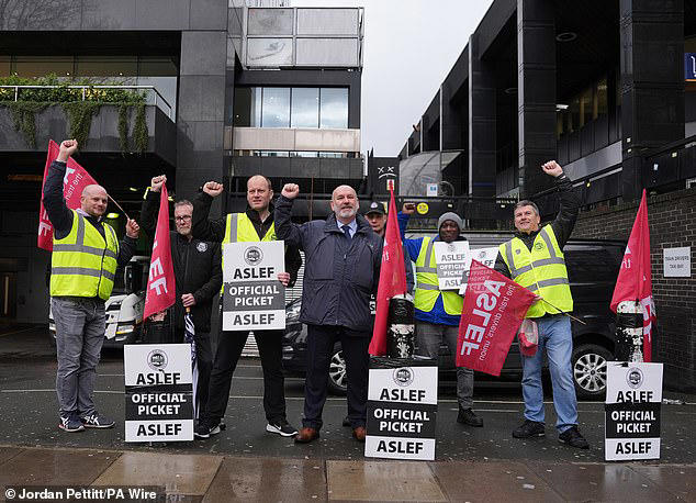 Aslef members on a picket line in April 2024. The RMT union hailed a ‘substantial victory’ after its members were given a 4.6 per cent pay hike with no strings attached such as reform of working practices