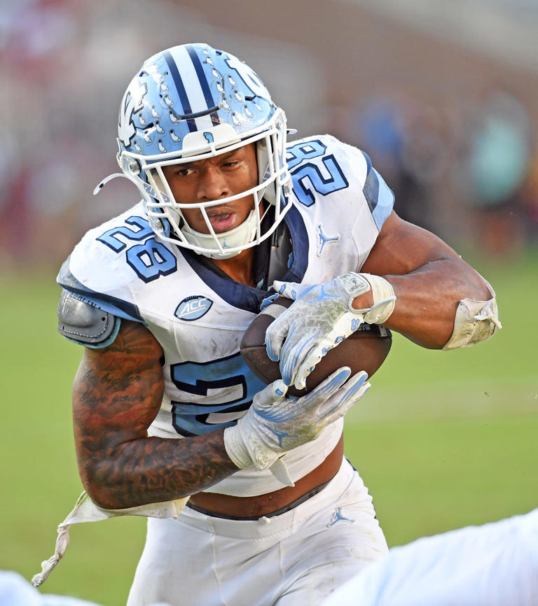 Omarion Hampton's career night helps UNC football beat Wake Forest ...