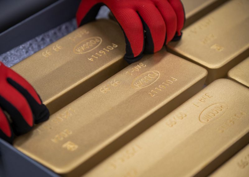 Gold Hits One-week High On Softer Dollar; Markets Await Fed Cues