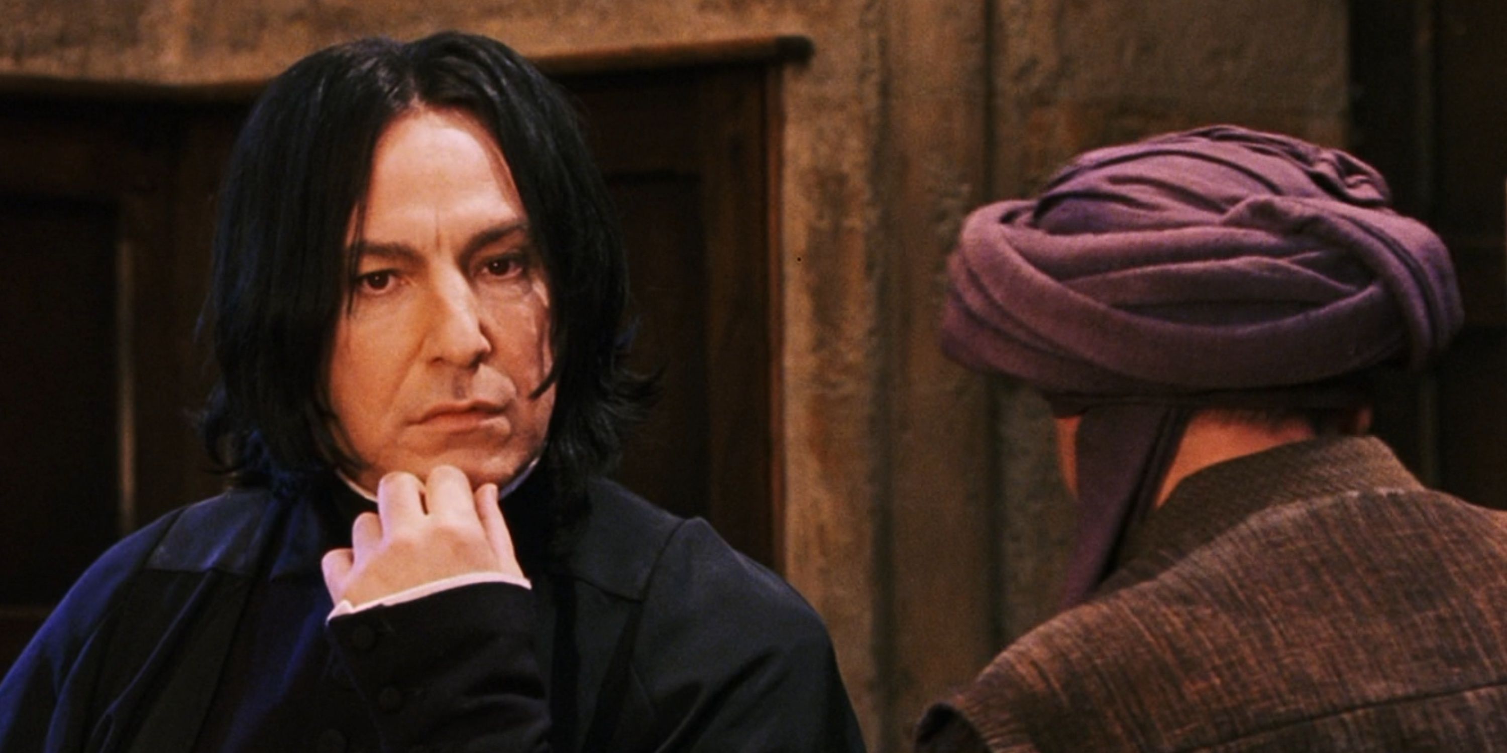 Snape stares at Harry in Harry Potter and the Sorcerer's Stone.
