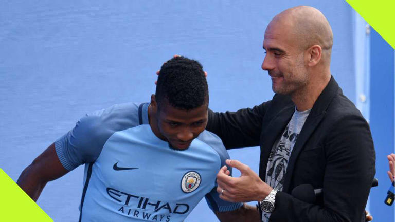 Kelechi Iheanacho and Pep Guardiola during the manager's unveiling as Manchester City boss in 2016. Photo by Oli Scarff. Source: AFP