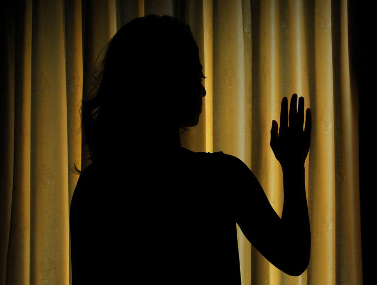 Woman at window