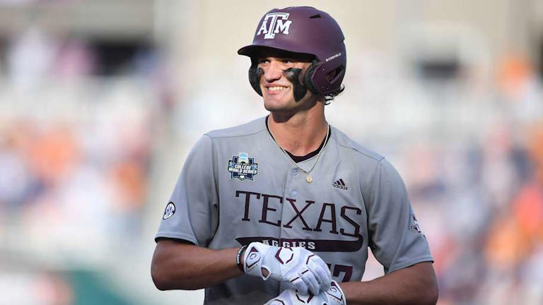 Texas A&M outfielder Jace LaViolette smiles during Game 3 of the NCAA College World Series against Tennessee on June 24 at Charles Schwab Field. | Brianna Paciorka/News Sentinel / USA TODAY NETWORK