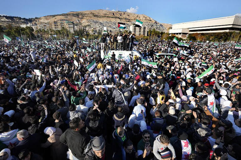 Syrians gather during a celebratory demonstration following the first Friday prayers since Bashar al-Assad's ouster in Damascus, 13 December, 2024 Hussein Malla/Copyright 2024 The AP. All right reserved