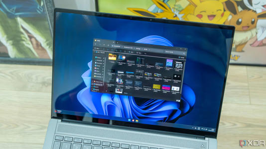 A Windows 11 laptop running File Explorer showing files from a connected Android phone