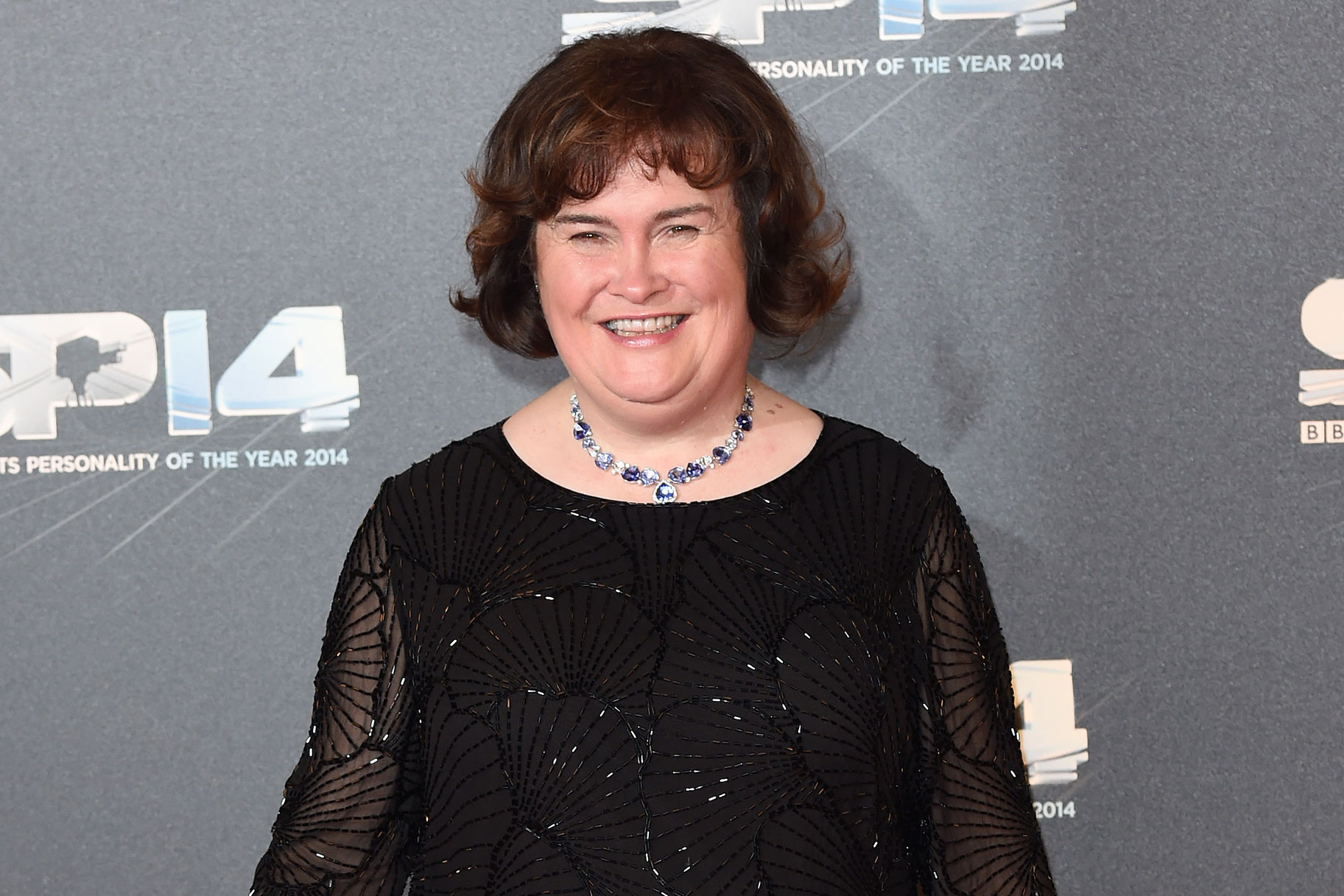 Susan Boyle Takes "O Holy Night' to Another Level Backed by a Children's  Choir