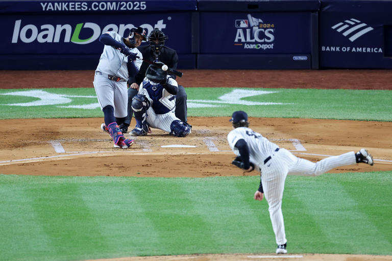 NEW YORK, NEW YORK - OCTOBER 15: Josh Naylor #22 of the Cleveland Guardians hits a single in the second inning against the New York Yankees during Game Two of the American League Championship Series at Yankee Stadium on October 15, 2024 in New York City. Luke Hales/Getty Images