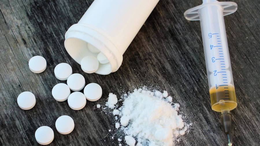 St. John woman charged after 4 kids test positive for drugs