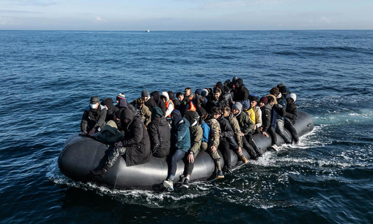 An inflatable dinghy carrying about 65 migrants crosses the Channel on 6 March 2024. Photograph: Dan Kitwood/Getty Images