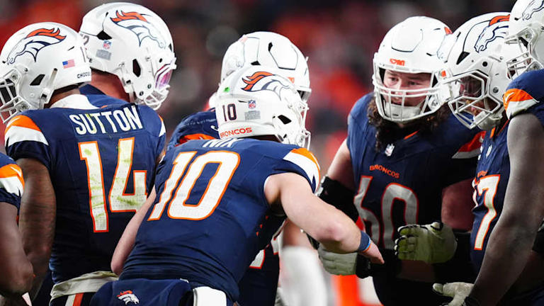 Dec 2, 2024; Denver, Colorado, USA; Denver Broncos quarterback Bo Nix (10) huddles with teammates in the second half against the Cleveland Browns at Empower Field at Mile High. | Ron Chenoy-Imagn Images