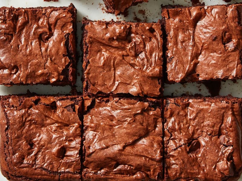 Overhead photo of Handle the Heat's chewy brownies on a marble surface