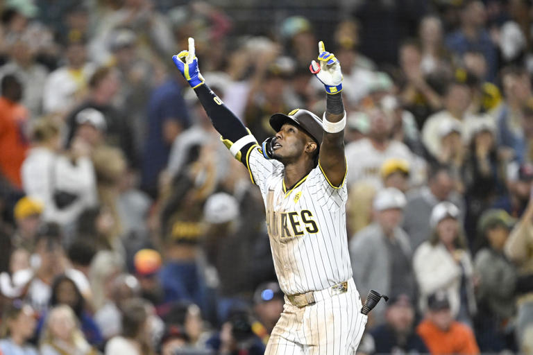 SAN DIEGO, CA – SEPTEMBER 16: Jurickson Profar #10 of the San Diego Padres points skyward after hitting a solo home run during the eighth inning of a baseball game against the Houston Astros, September 16, 2024 at Petco Park in San Diego, California. (Photo by Denis Poroy/Getty Images)