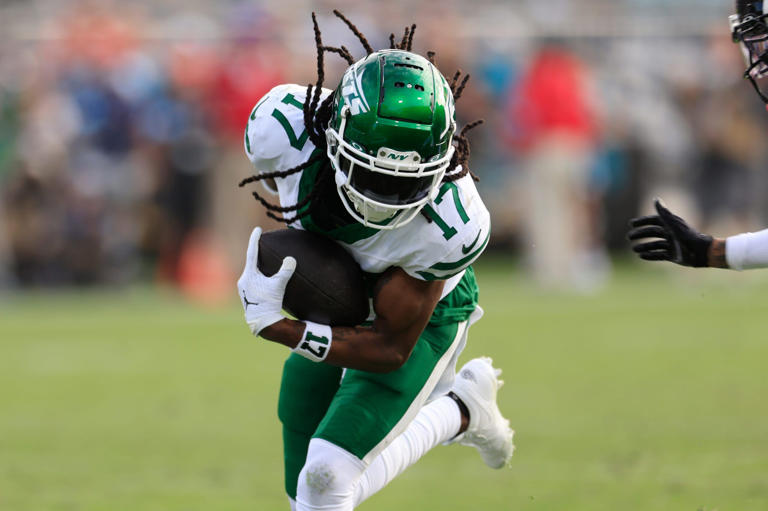 New York Jets wide receiver Davante Adams (17) rushes for yards during the third quarter Sunday, Dec. 15, 2024 at EverBank Stadium in Jacksonville, Fla. The Jets held off the Jaguars 32-25. [Corey Perrine/Florida Times-Union]