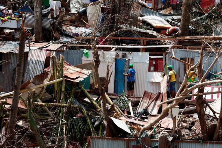 France's Mayotte cleans up after cyclone, death toll still unclear