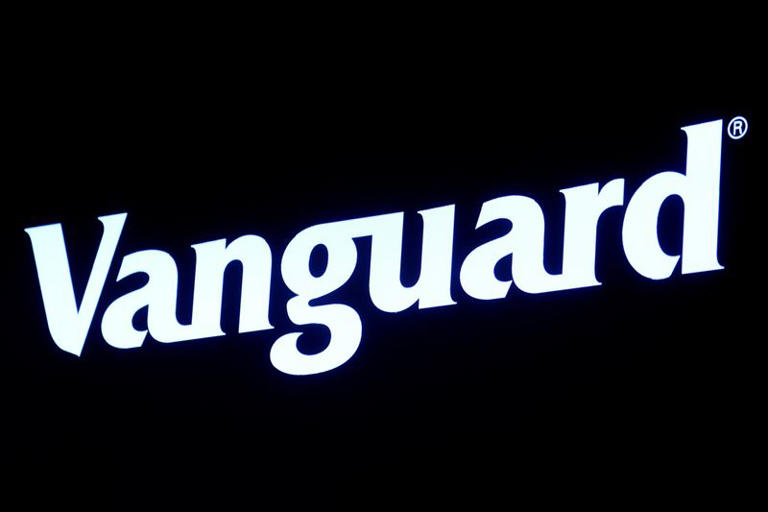 FILE PHOTO: The logo for Vanguard is displayed on a screen on the floor of the New York Stock Exchange (NYSE) in New York City, U.S., June 1, 2022. REUTERS/Brendan McDermid/File Photo