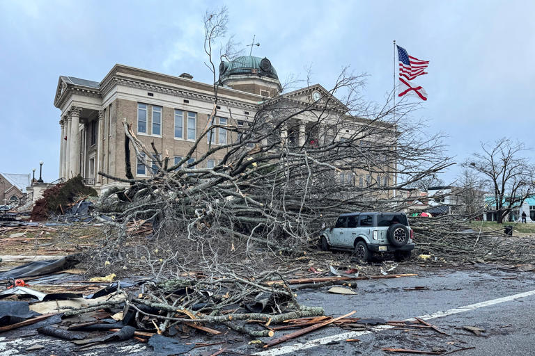 Damage in downtown in Athens, Ala., on Sunday after a storm rolled through Saturday night.