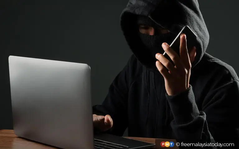 2 Malaysians nabbed in Singapore over links to Govt official ...