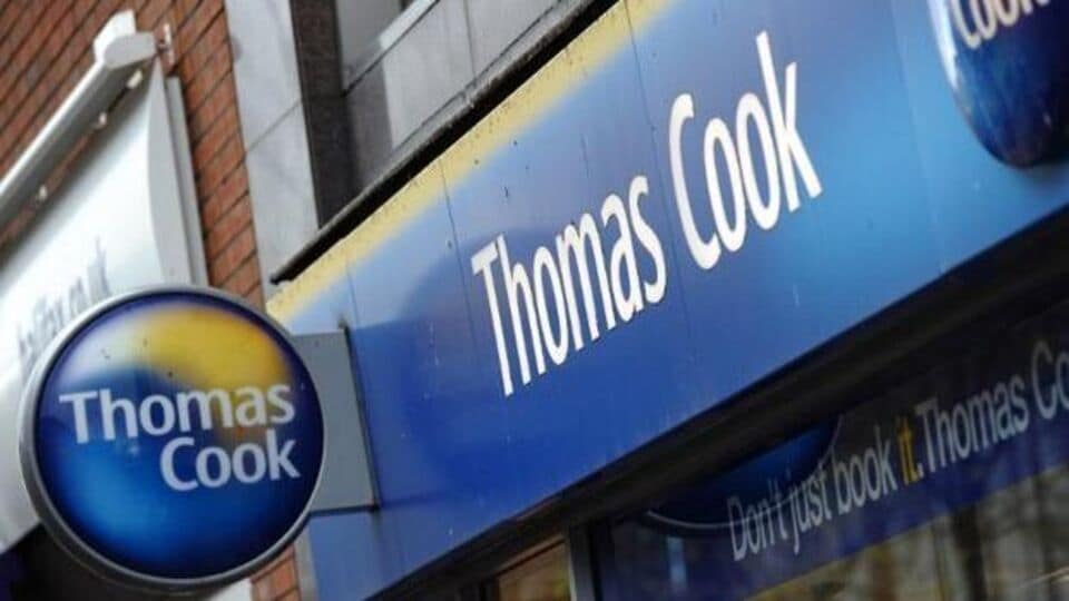 Thomas cook logo. Tom cook has a big. Thomas cook group plc. His house have или has. Thomas cook.