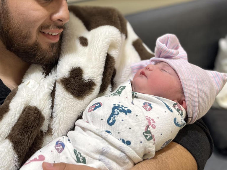 Parents celebrate the arrival of first babies of 2025