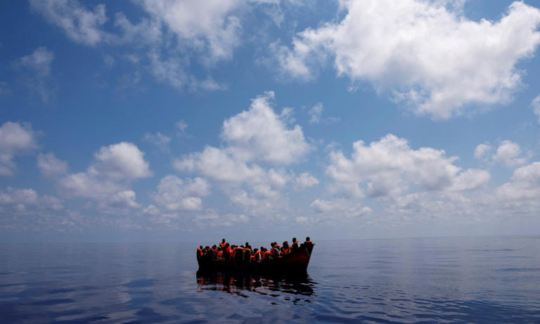 A rescue boat assists migrants in international waters south of the island of Lampedusa, Italy, in August 2024. Photograph: Juan Medina/Reuters