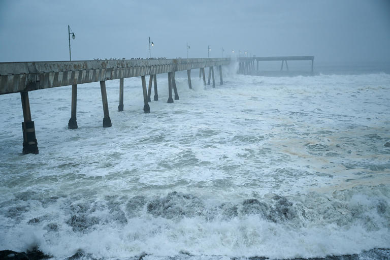 A view of big waves in the Pacific Ocean at the municipal pier in Pacifica, Calif., on Dec. 22, 2024.