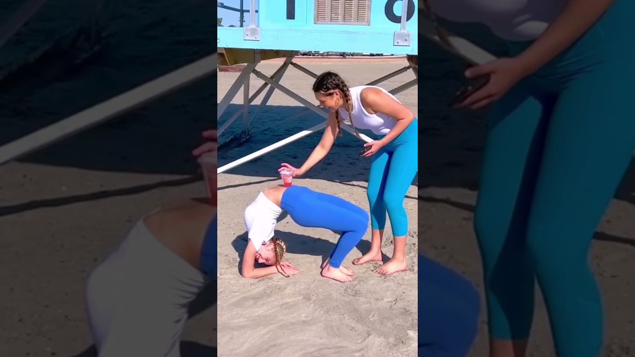 Sister Gymnasts Face Off in Flexibility Challenge