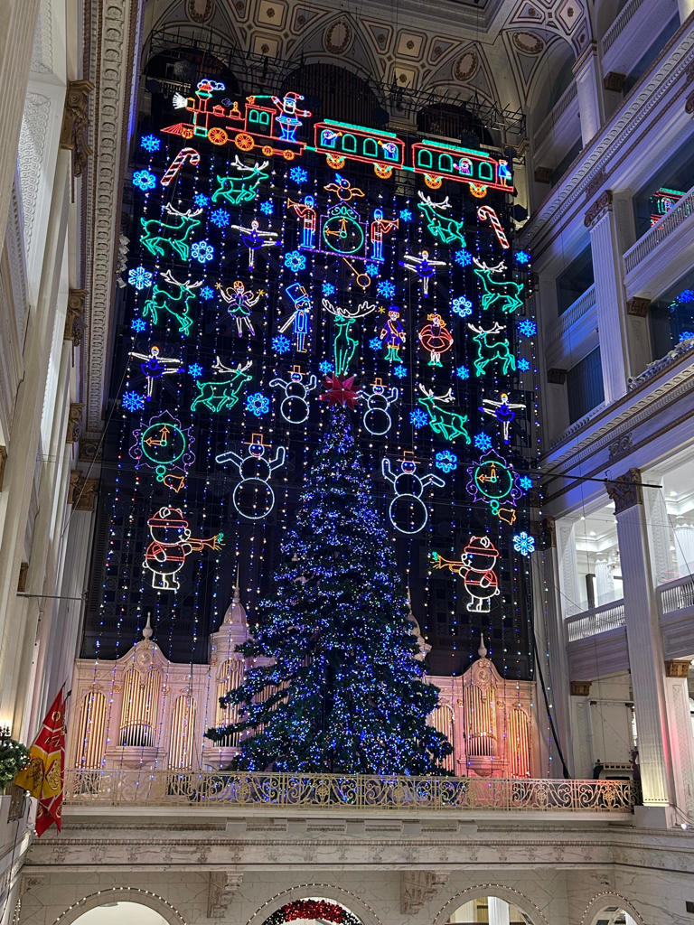 The finale of the light show at Macy's in Philadelphia draws applause from shoppers and visitors five times a day during the holiday season.