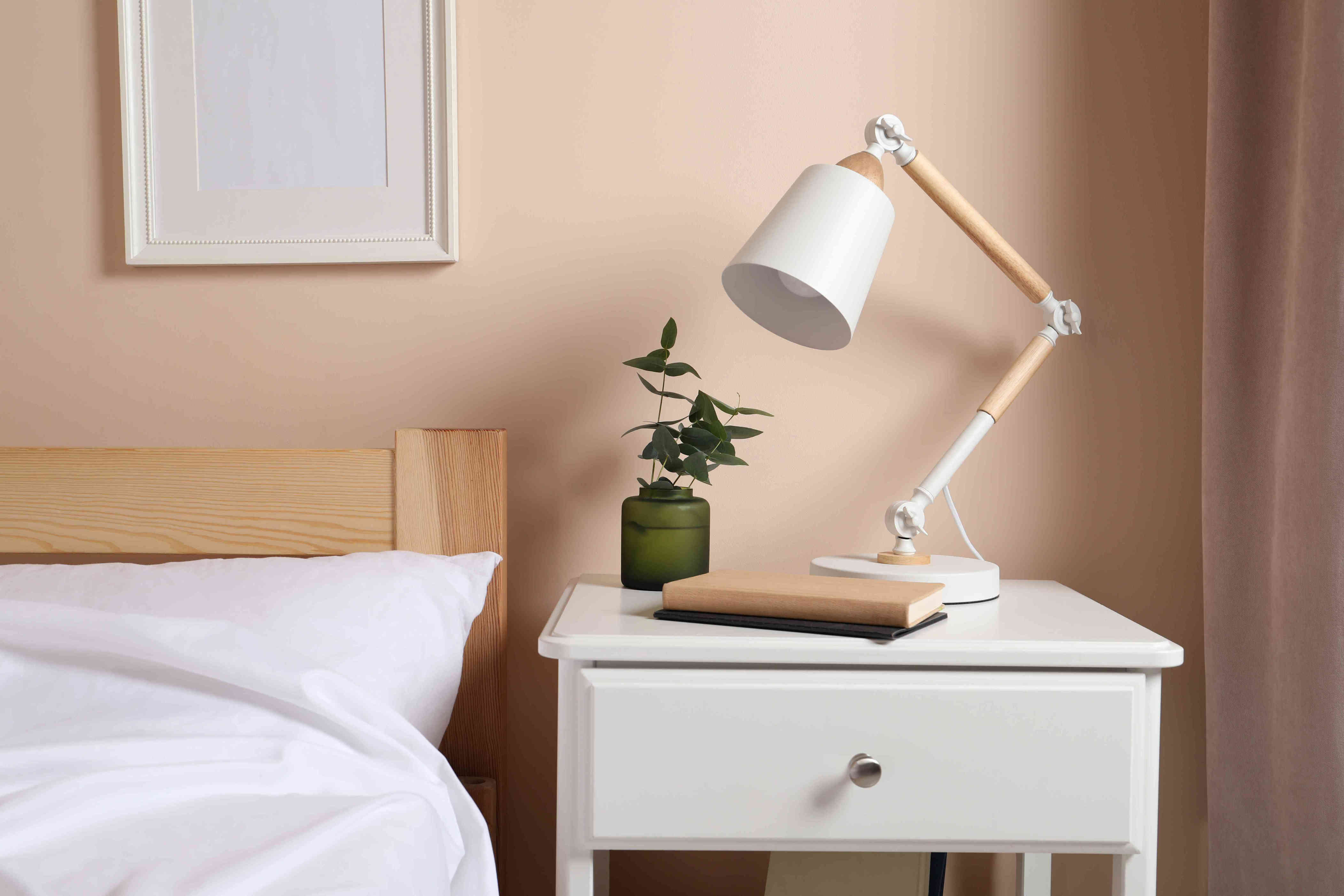 6 Things You Should Never Keep on Your Night stand, According to Home Experts