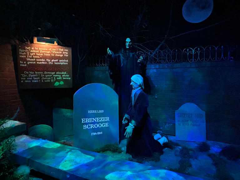 Ebenezer Scrooge is confronted with the consequences of his life's choices in a walk-through version of Charles Dickens' "A Christmas Carol" at Macy's in Philadelphia.